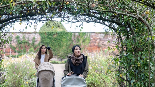 Visitors walking in the Walled Garden in autumn at Tatton Park, Cheshire